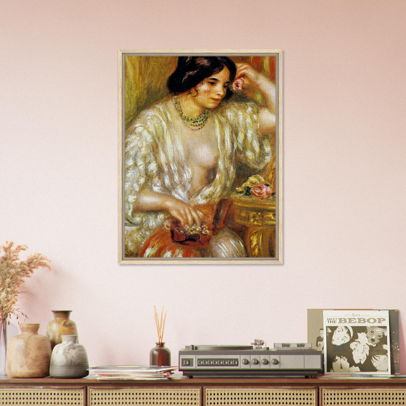 Gabrielle aux bijoux de Pierre-Auguste Renoir, œuvre impressionniste reproduite sur toile avec cadre en bois clair, pour décoration murale.
