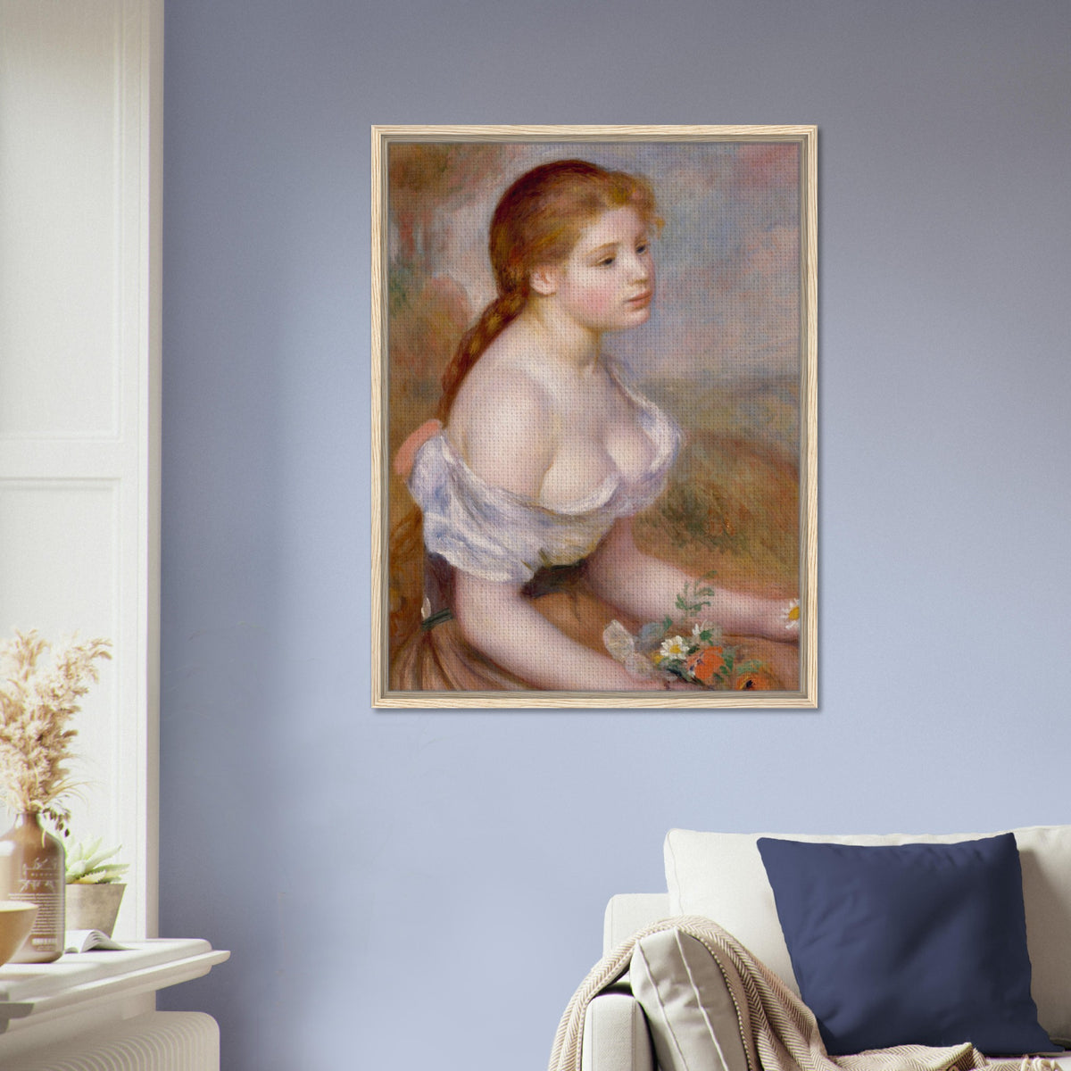 Jeune fille aux marguerites de Pierre-Auguste Renoir, œuvre impressionniste reproduite sur toile avec cadre en bois clair, pour décoration murale.